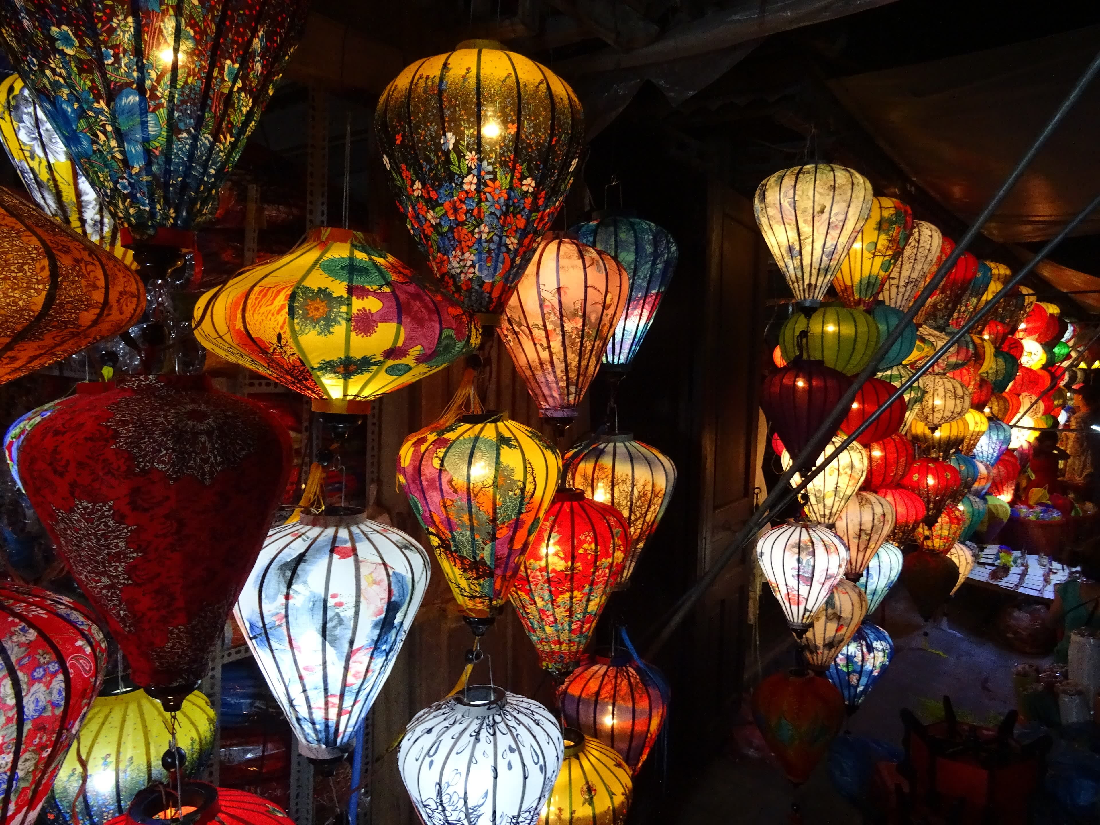 Hand-made silk lanterns glowing in every colour