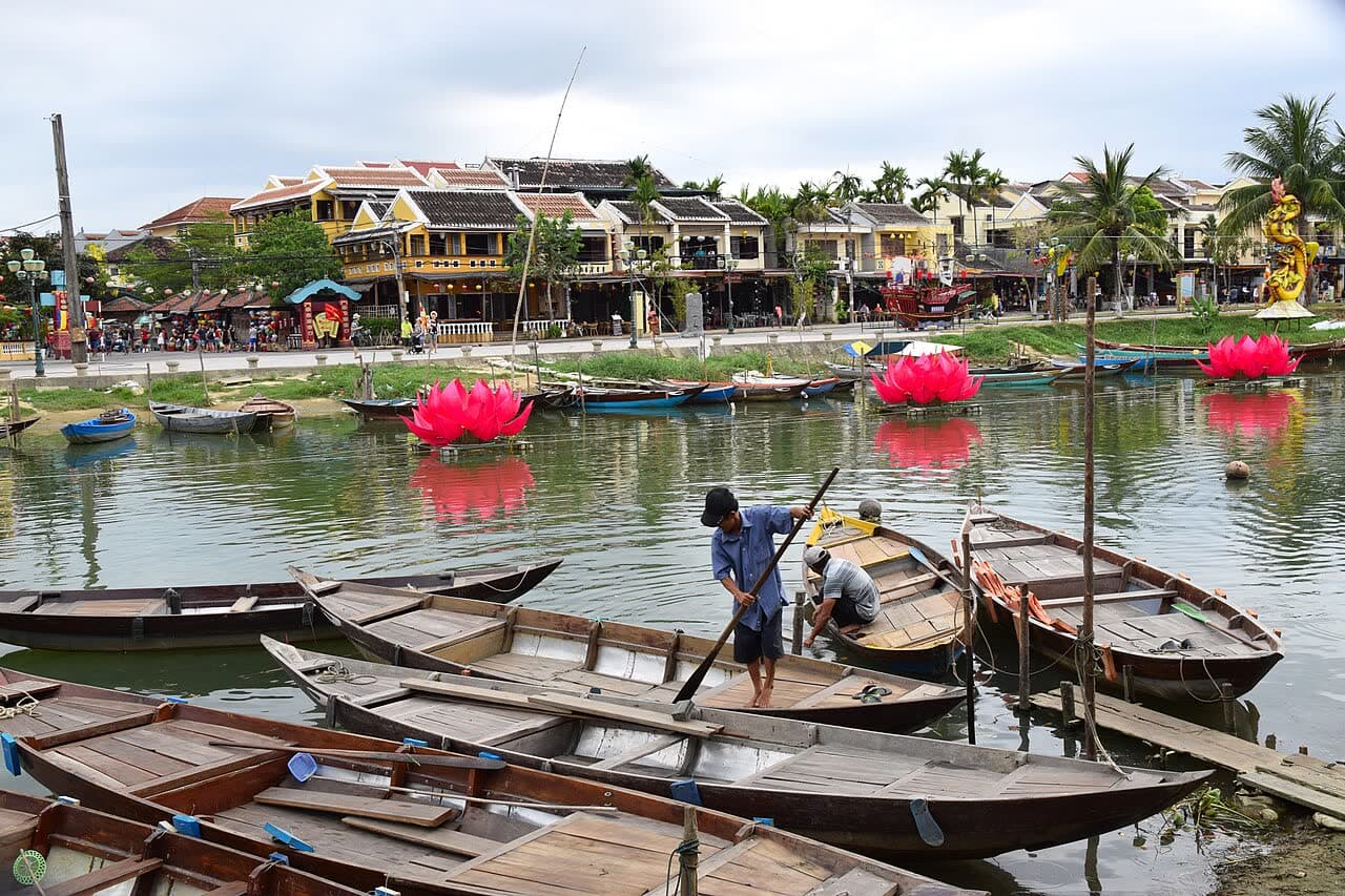 Wooden boats moored on the river in Hoi An